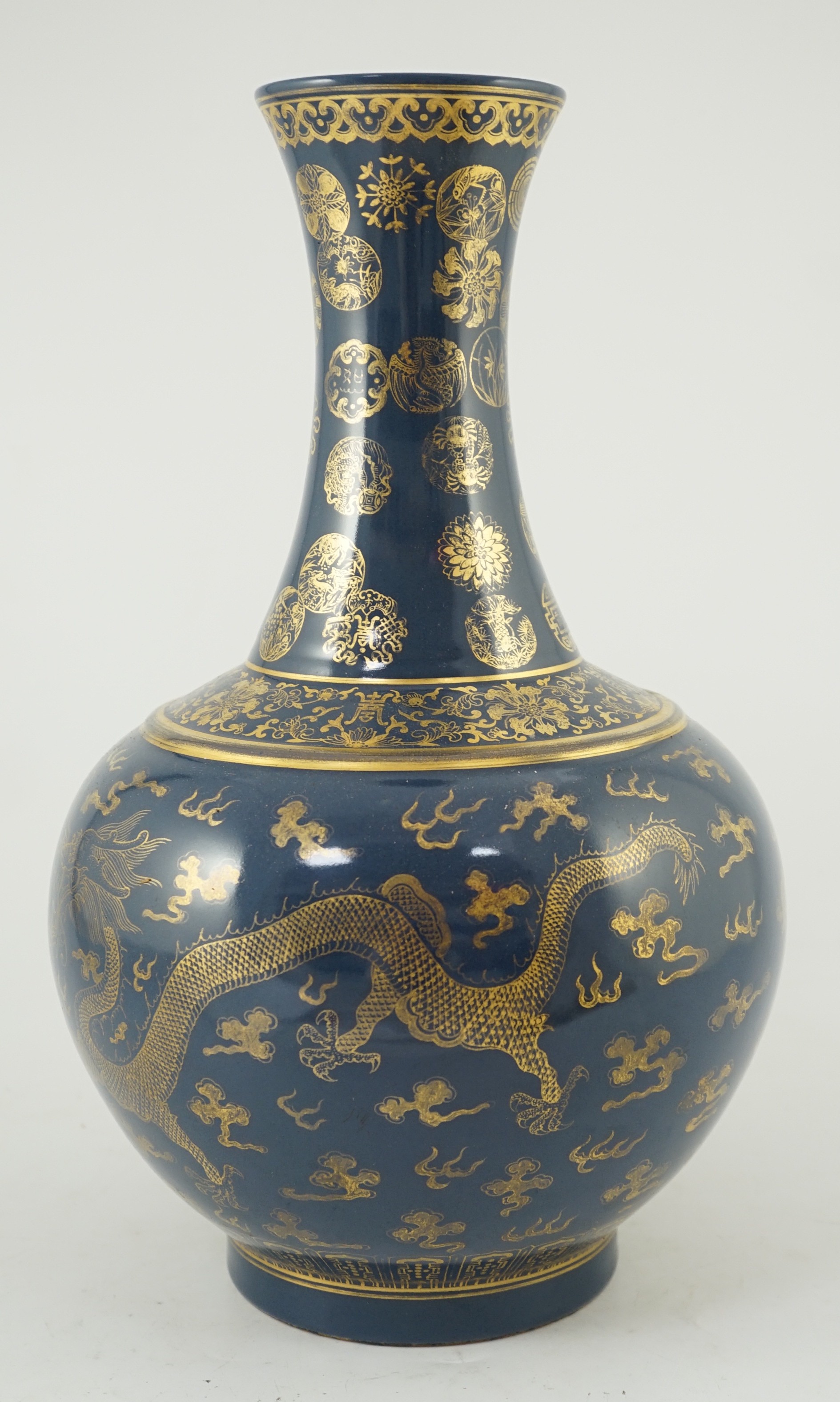 A Chinese gilt decorated blue ground ‘dragon’ vase, Guangxu mark but later, 38.5cm high, wear to gilding